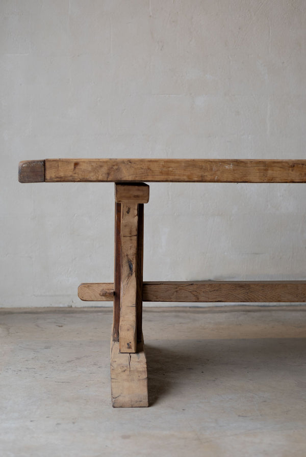 Side view of wooden dining table top profile and silhouette with rustic tone.