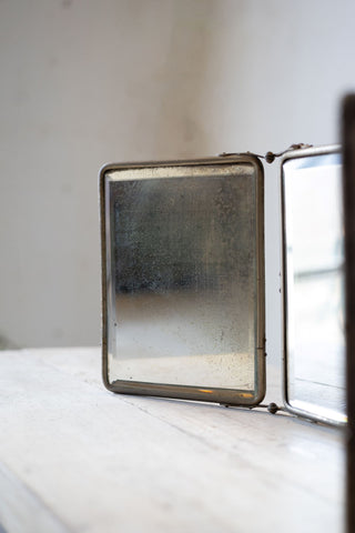 Single panel of barber mirror on a white background