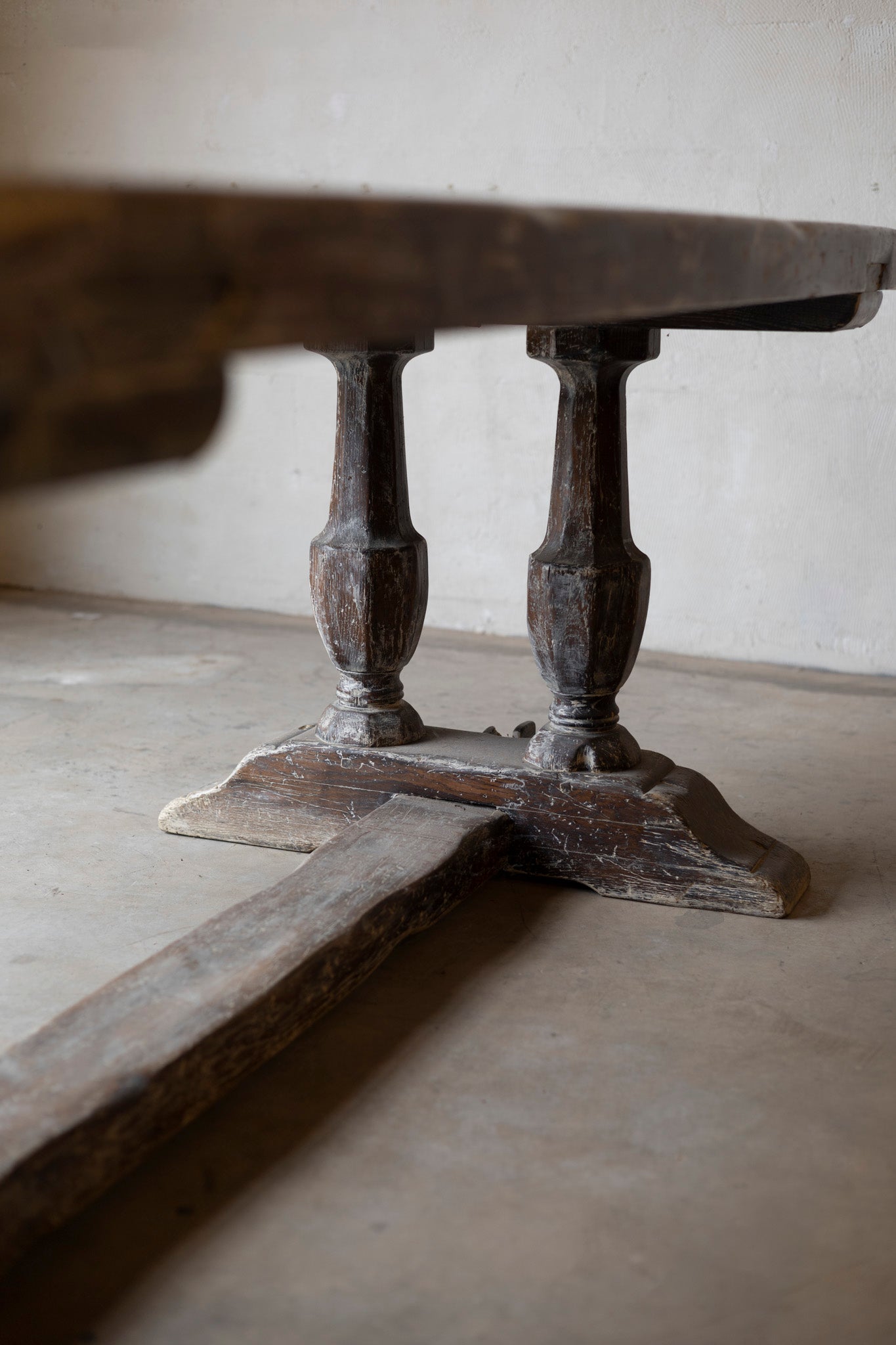 Wooden table with a rustic design on a plain surface