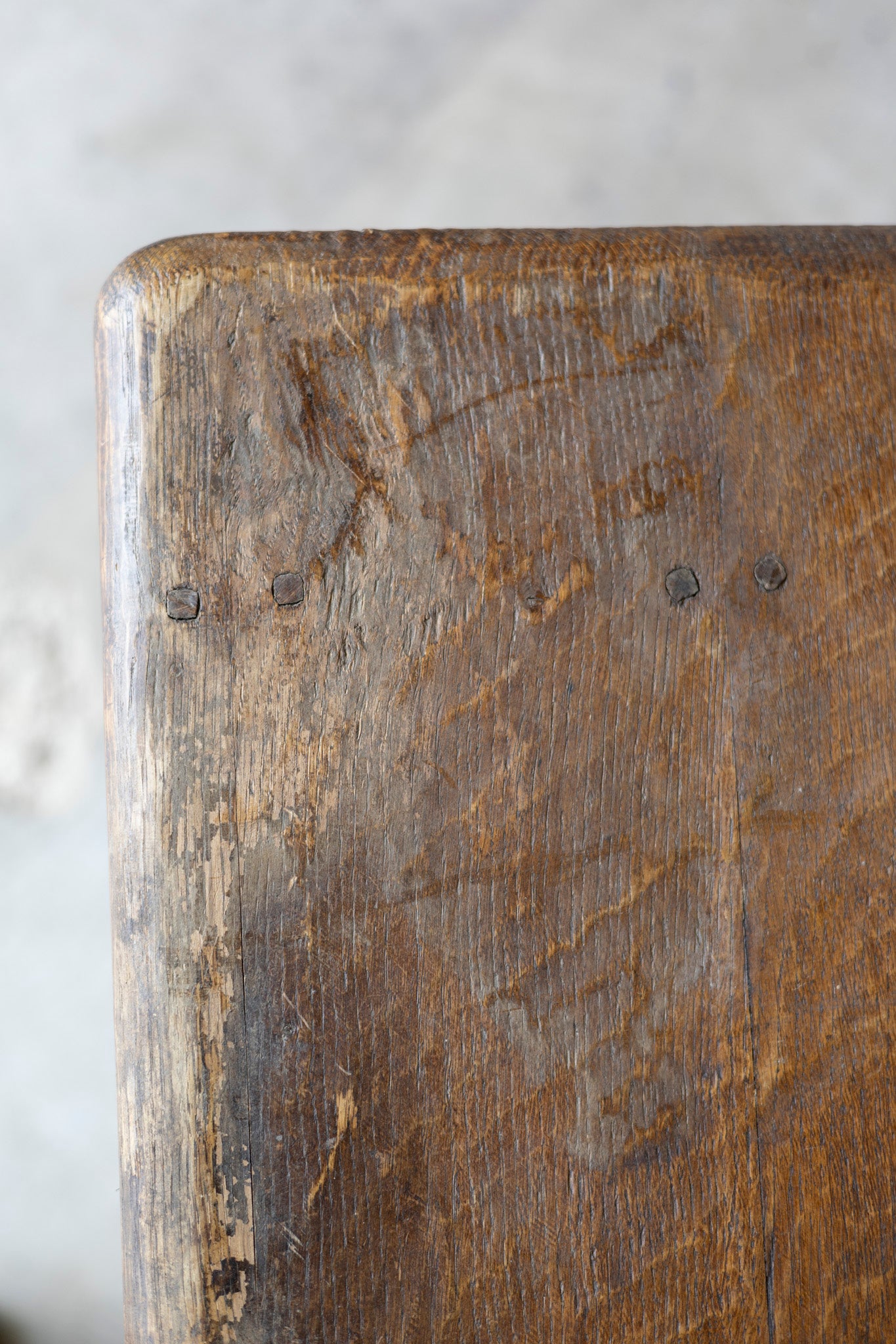 Close-up of a wooden table with visible grain and texture