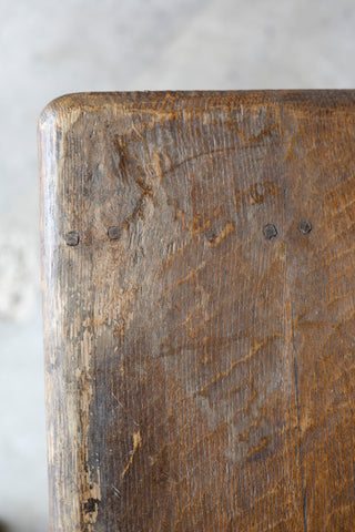 Close-up of a wooden table with visible grain and texture