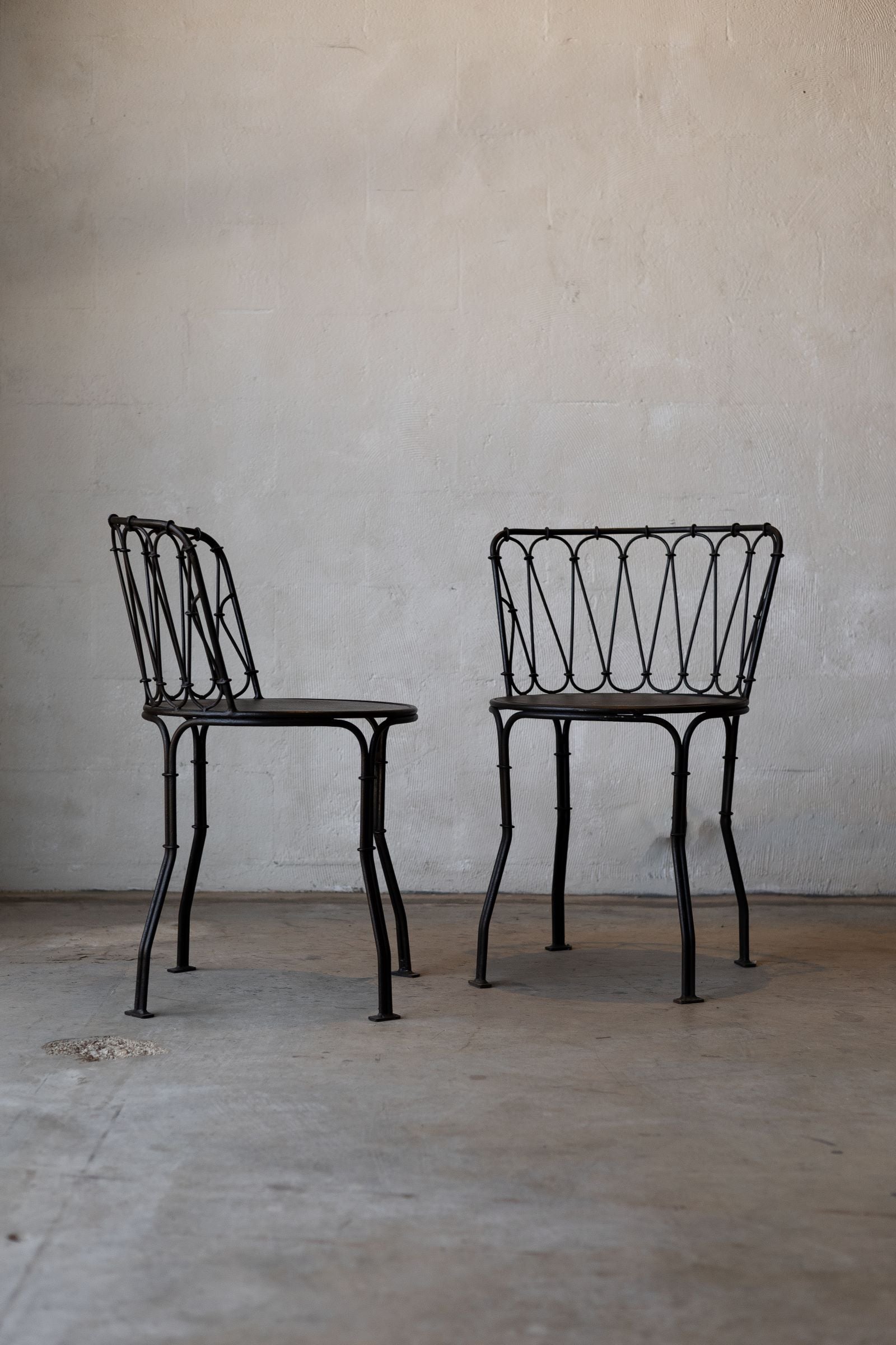 Pair of Iron French bistro style dining chairs. 
