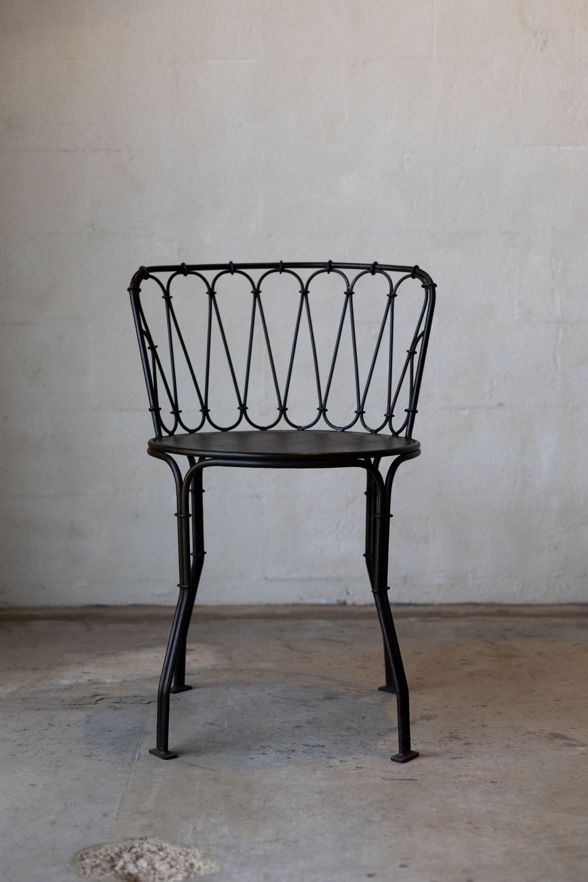 Iron French bistro style dining chair. 