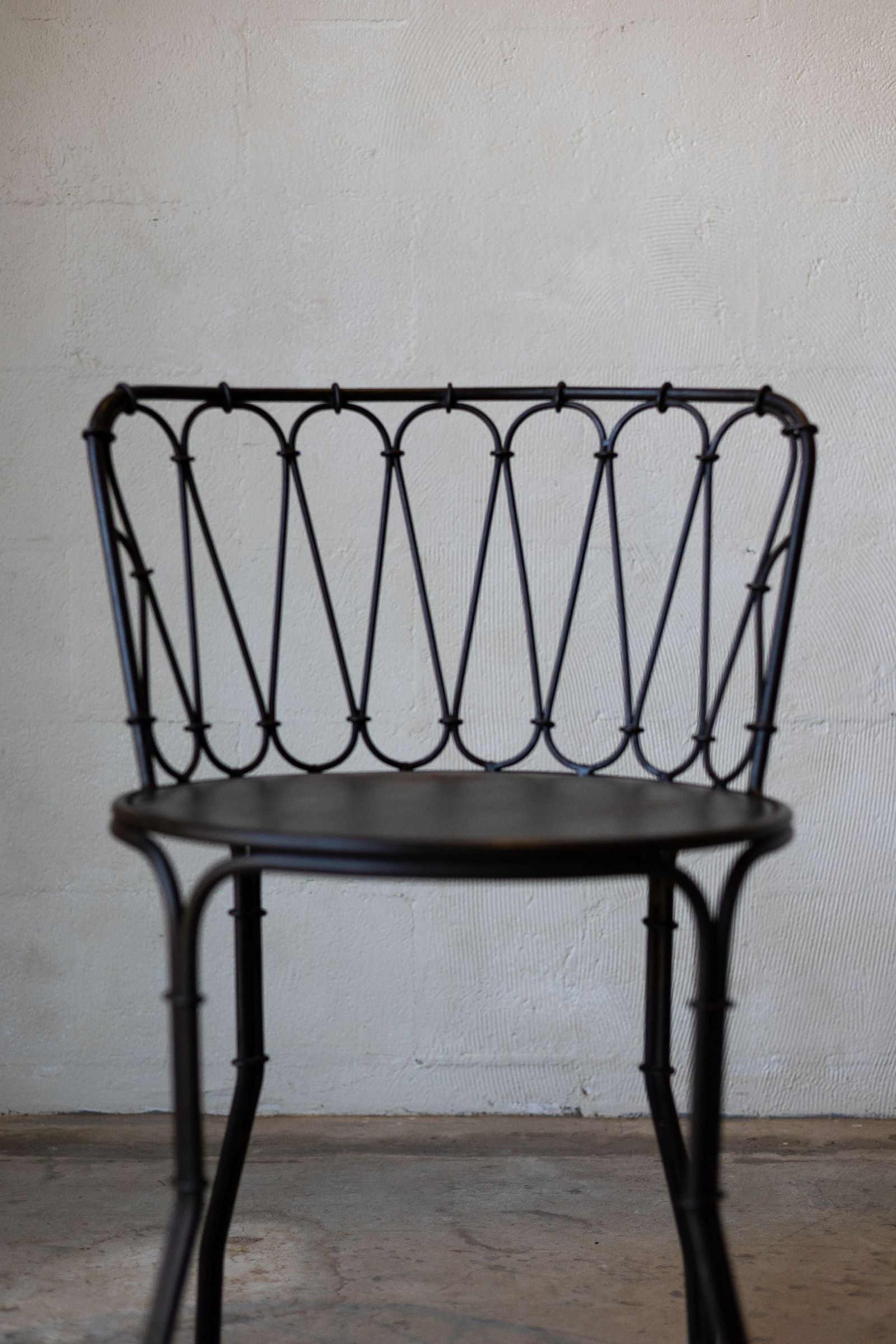 Iron French bistro style dining chair. 