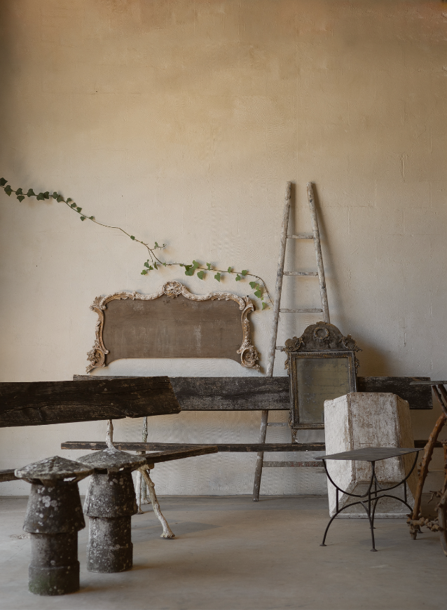 Vintage room setting with rustic furniture and decor.