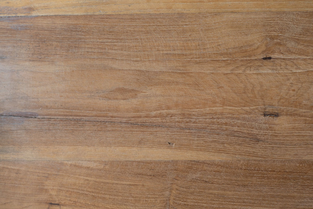 Close up of teak wood finish of cheese board.