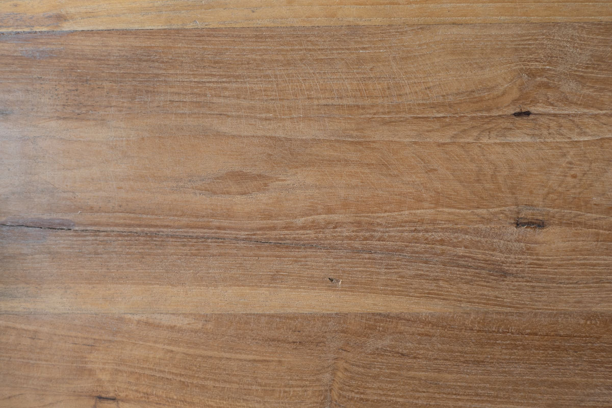 Close up of teak wood finish of cheese board.