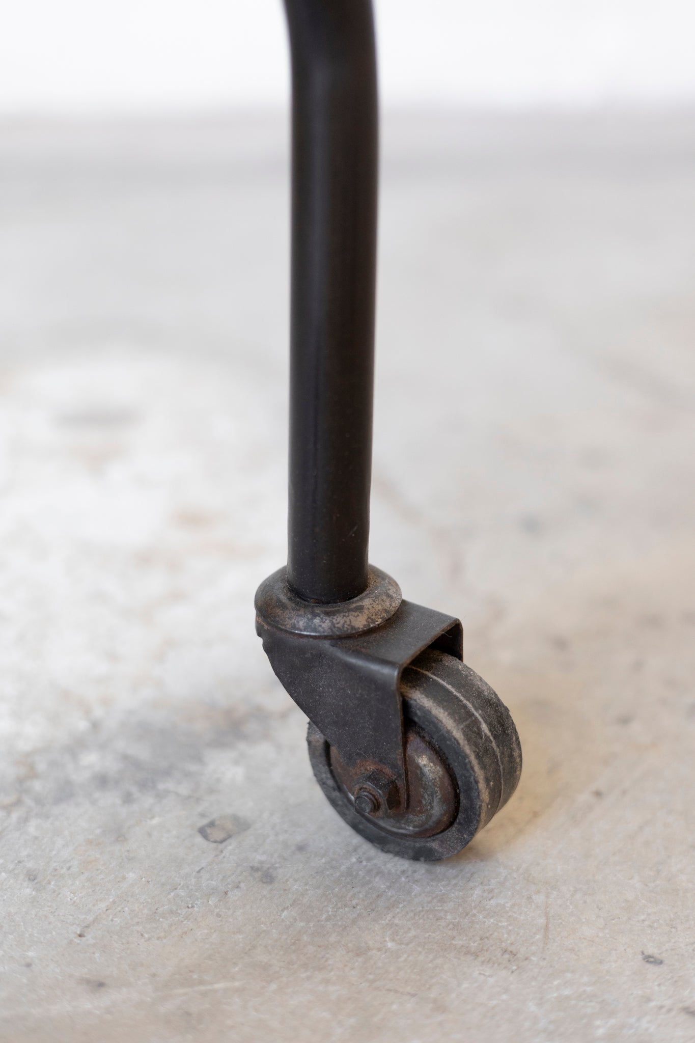 Metal caster wheel on a concrete floor