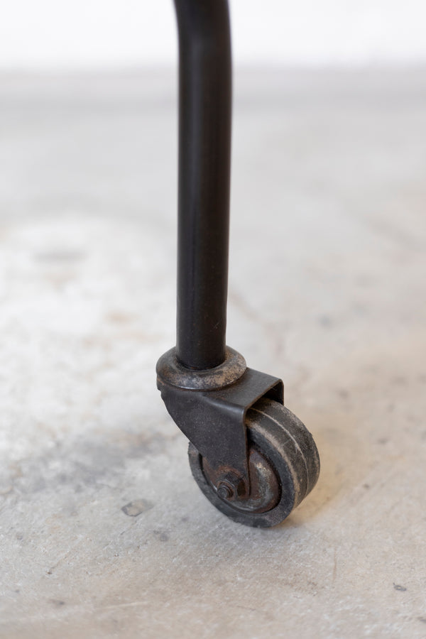 Metal caster wheel on a concrete floor