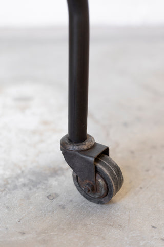 Metal caster wheel on a concrete floor