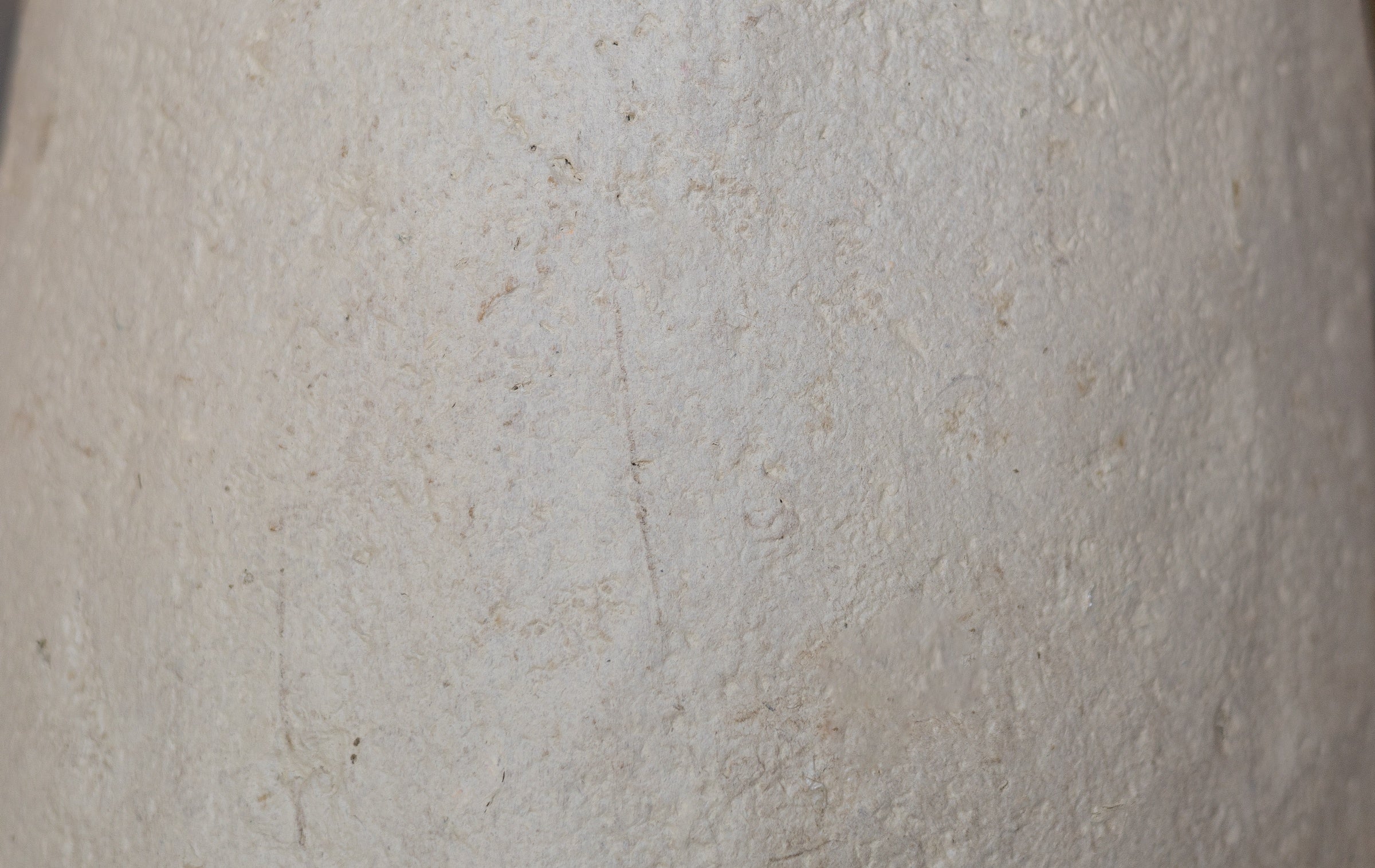 Close-up of a textured white surface of pendant light.