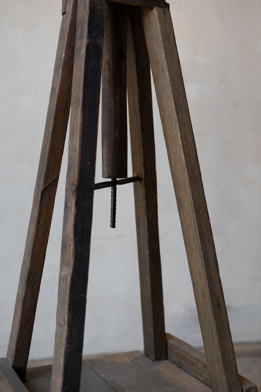 Legs of reclaimed wood sculpture stand.